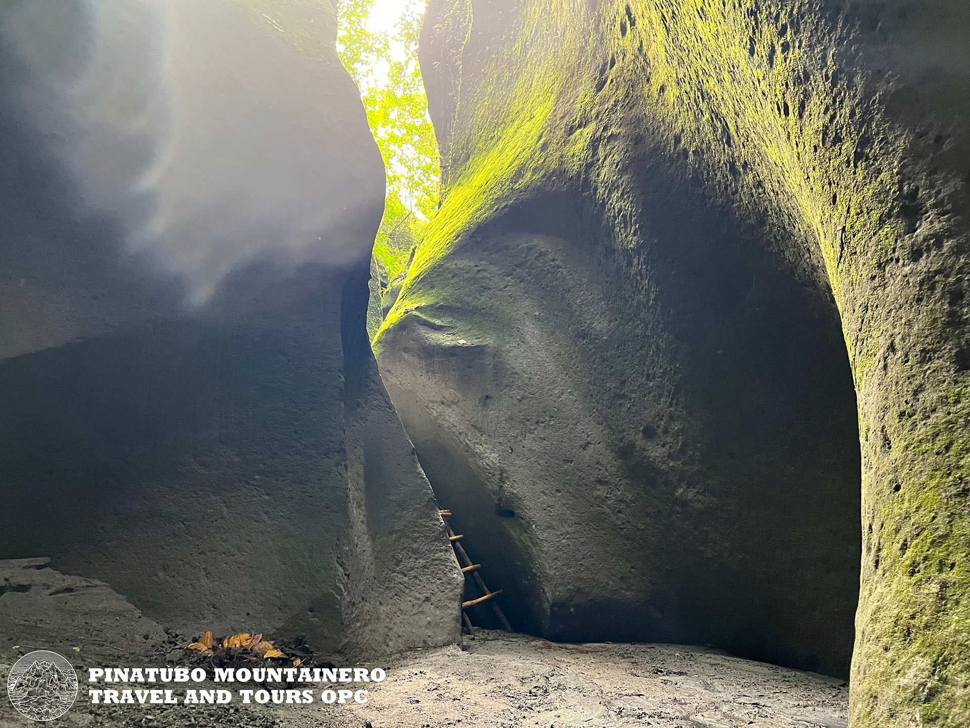 Gorge walking at Tutulari with makeshift ladders by local Ayta
